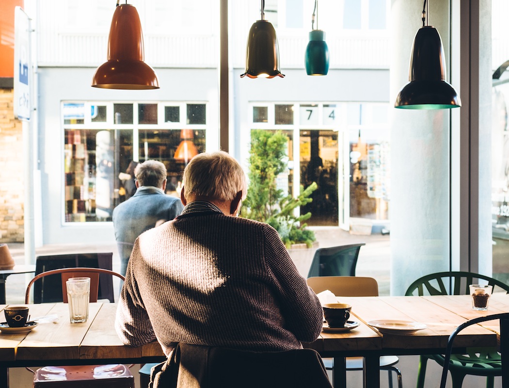 unsplash old man at coffee shop sovrn.com